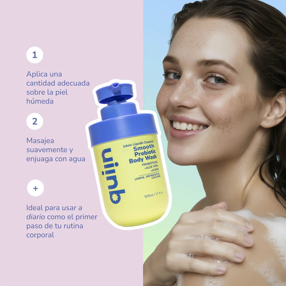 Mujer con espuma en el hombro usando gel de baño suave Quiin